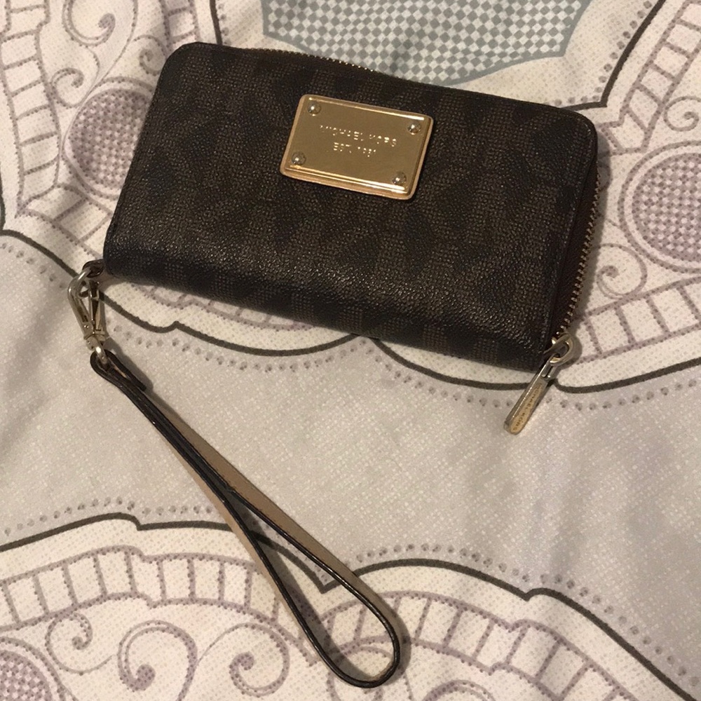 Monogram brown Michael Kors wristlet